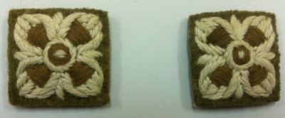 UK WWI and WWII padded rank stars (pips) on khaki wool